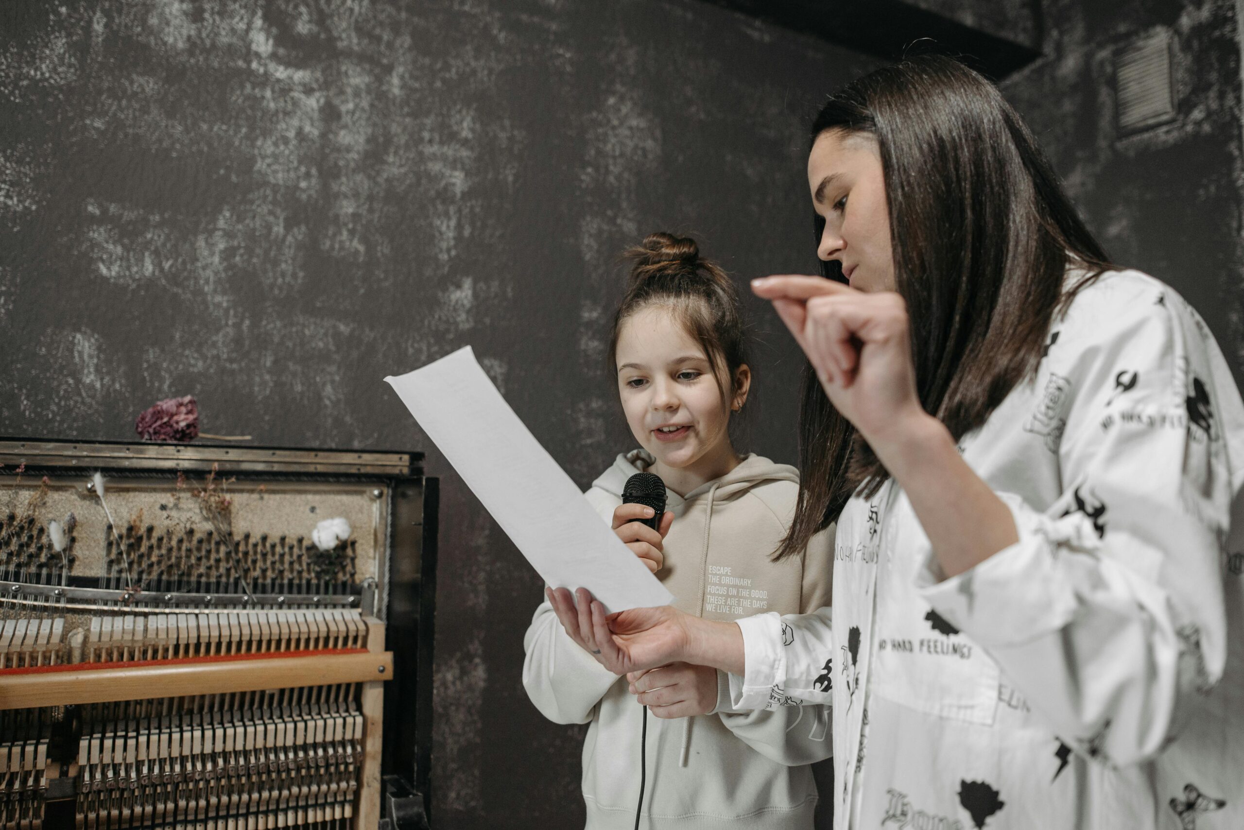Music instructor jobs for vocalists - mentor guiding a student